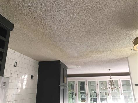Ugly popcorn ceiling texture in non updated room