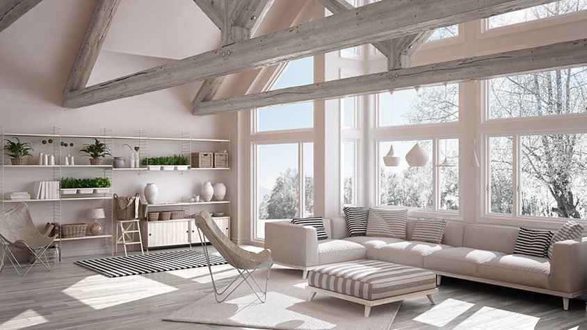 Sitting area featuring modern furniture showcasing the extensive repairs and painting